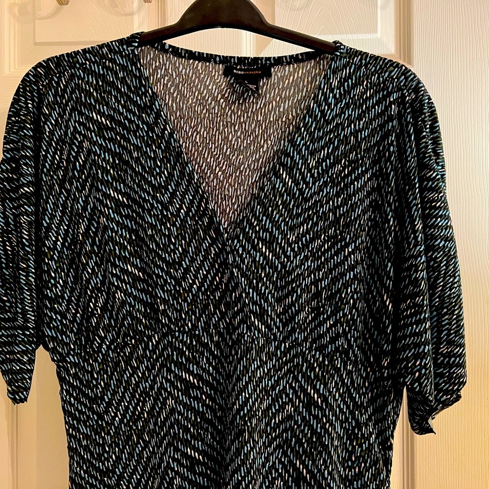 BCBG MAZAZIRA DRESS. This dress is in great condition.polyester (95% spandex 5%.